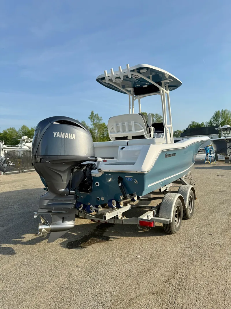 Slide: The Image of 2025 Tidewater 210 LXF boat with Yamaha engine on a trailer. - 3