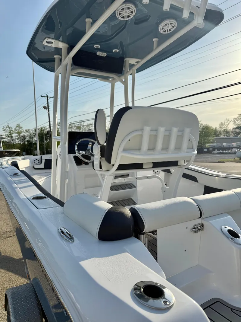 Slide: The Image of 2025 Tidewater 210 LXF boat with sleek design and modern seating. - 7