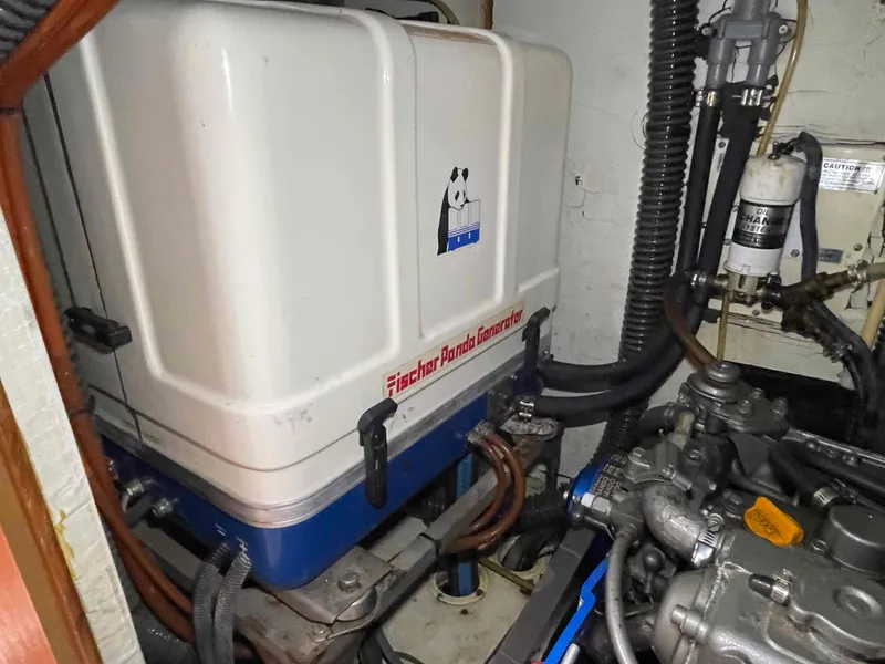 Slide: The Image of Engine room of 2006 Hunter 45 Center Cockpit with Fischer Panda generator. - 15