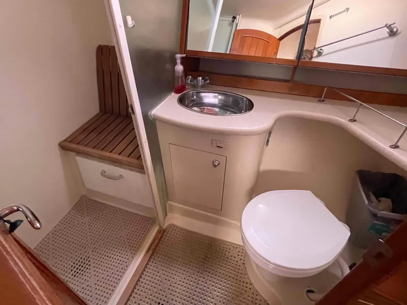 Slide: The Image of Bathroom interior of 2006 Hunter 45 Center Cockpit yacht with sink and toilet. - 21