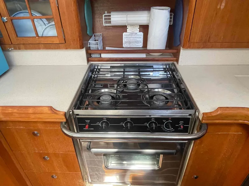 Slide: The Image of Stainless steel stove in 2006 Hunter 45 Center Cockpit yacht kitchen. - 26