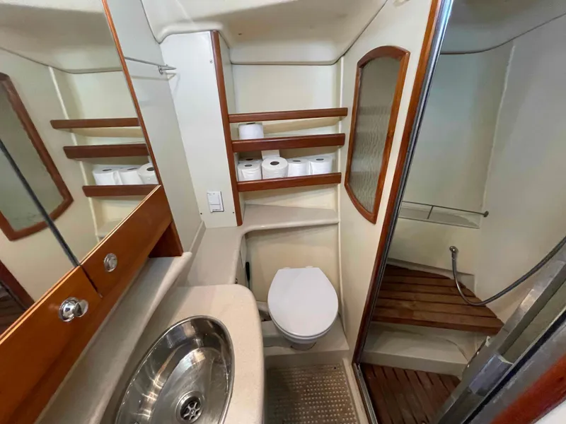 Slide: The Image of Bathroom interior of 2006 Hunter 45 Center Cockpit yacht with sink, toilet, and shower. - 37