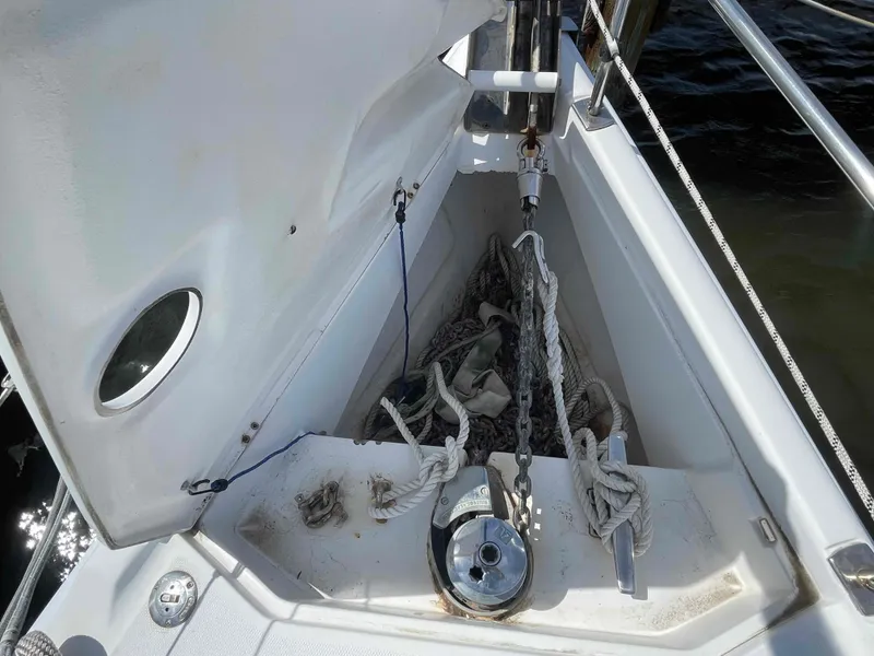 Slide: The Image of Anchor locker of 2006 Hunter 45 Center Cockpit sailboat with ropes and anchor chain. - 42