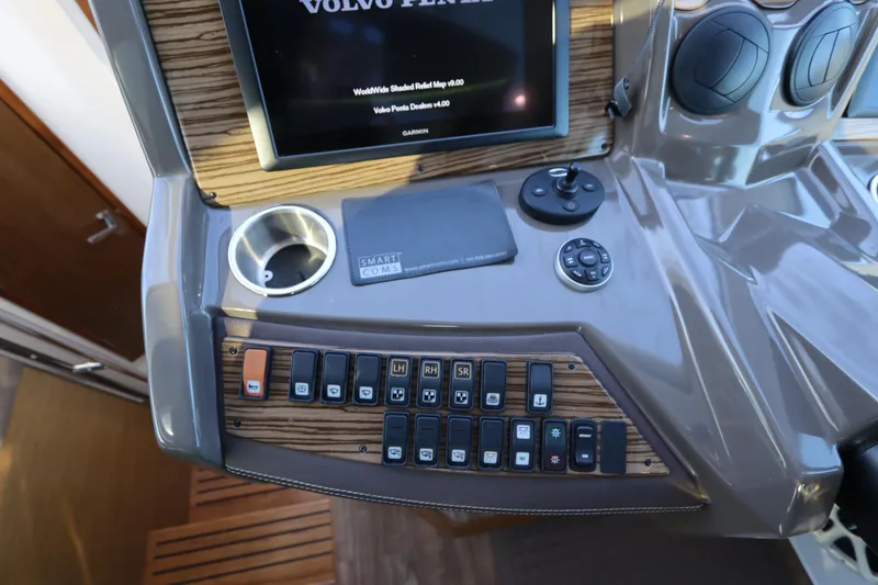 Slide: The Image of 2015 Cruisers Cantius dashboard with control panel and display screen. - 49