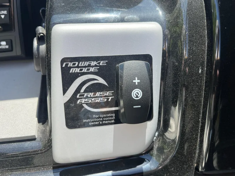 Slide: The Image of Control panel of 2022 Yamaha AR210 boat featuring No Wake Mode and Cruise Assist. - 19