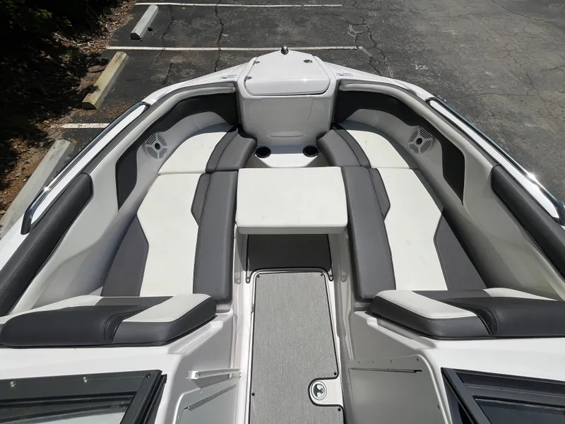 Slide: The Image of 2022 Yamaha Boats AR210 interior with sleek seating and modern design. - 25