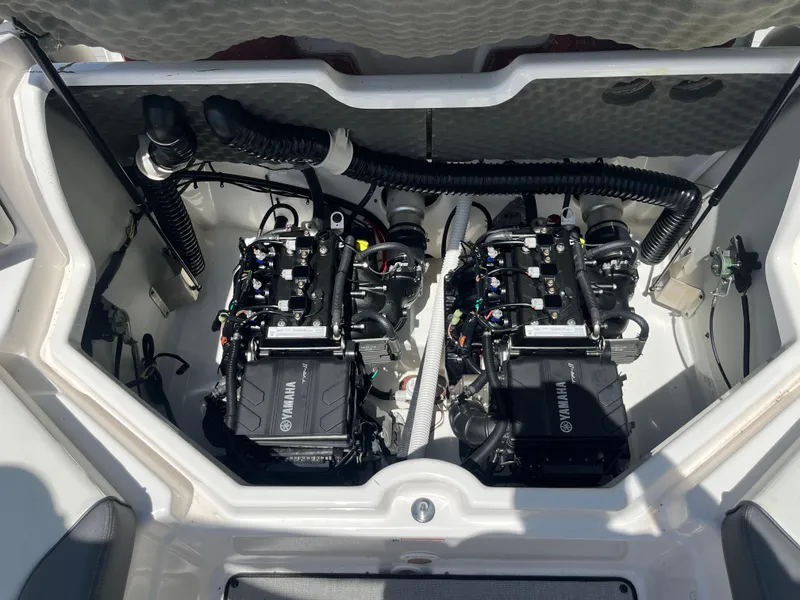 Slide: The Image of 2022 Yamaha AR210 boat engine compartment with dual engines visible. - 27