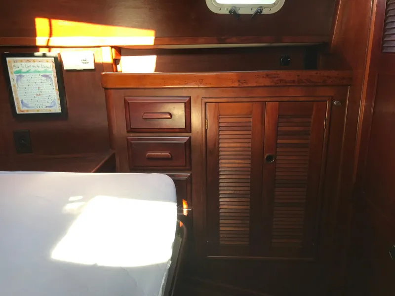 Slide: The Image of Wooden interior of 1990 Endeavour 38 CC sailboat with cabinets and drawers. - 8