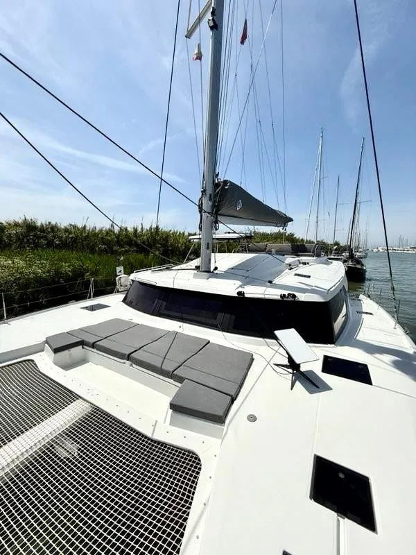 Slide: The Image of 2022 Fountaine Pajot Elba 45 catamaran with spacious deck and modern design. - 12