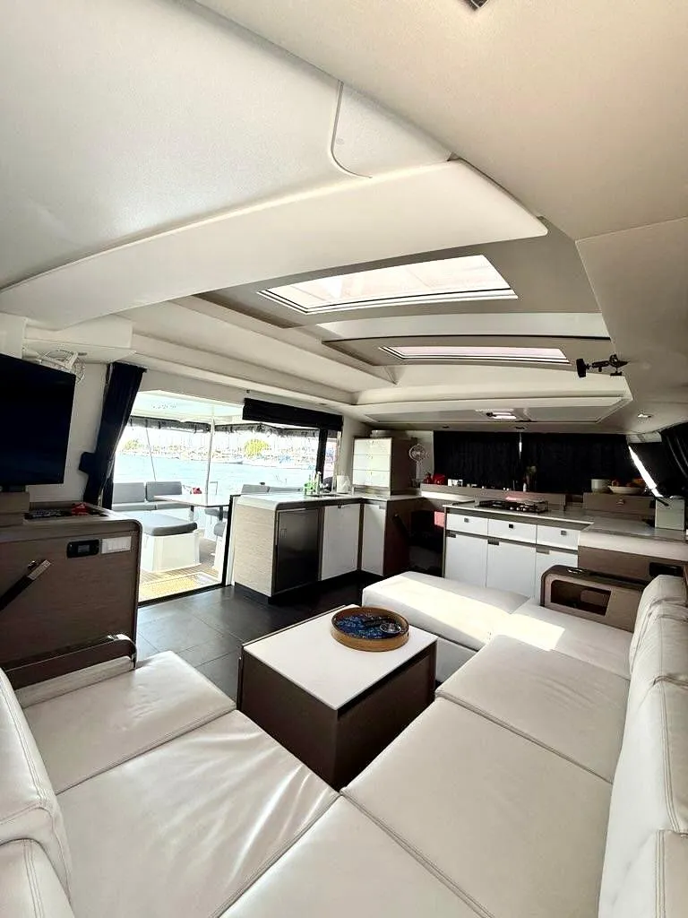 Slide: The Image of Luxurious interior of 2022 Fountaine Pajot Elba 45 catamaran with modern furnishings. - 21