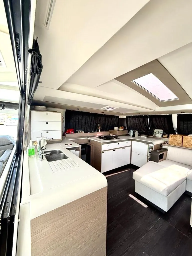 Slide: The Image of Modern kitchen interior of 2022 Fountaine Pajot Elba 45 catamaran with sleek design. - 23