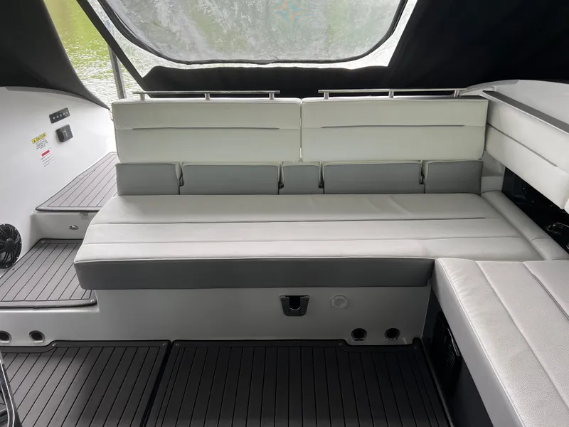 Slide: The Image of 2022 Cobalt A36BR boat interior with sleek seating and modern design. - 27