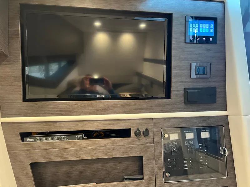 Slide: The Image of 2022 Cobalt A36BR interior with modern entertainment system and control panel. - 31