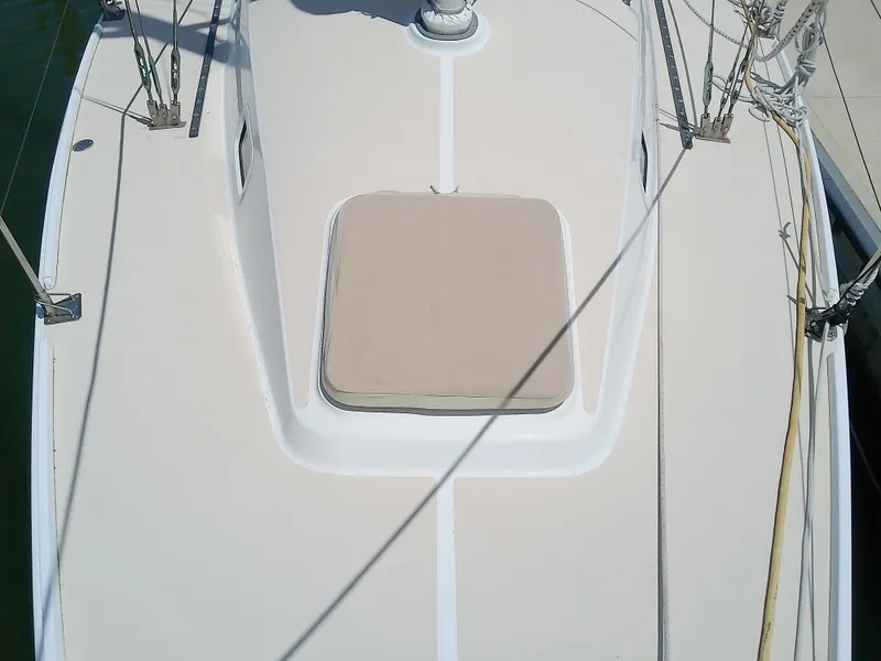 Slide: The Image of 2004 J Boats J/32 sailboat with Doyle sail cover at marina. - 17