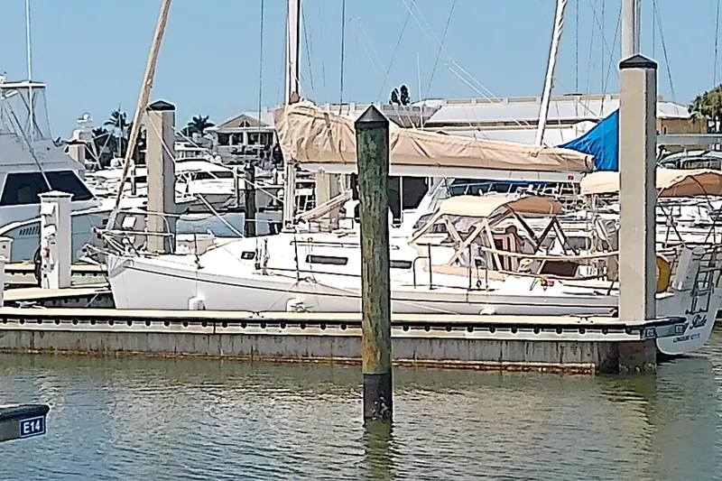 Slide: The Image of 2004 J Boats J/32 sailboat docked at a marina. - 3