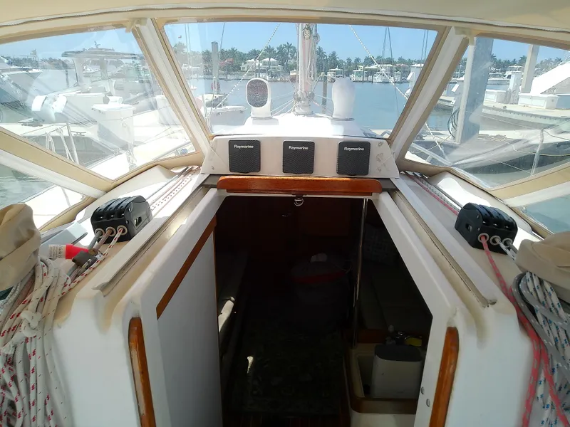 Slide: The Image of 2004 J Boats J/32 sailboat docked at marina, named "Joy Ride," Longboat Key, FL. - 30