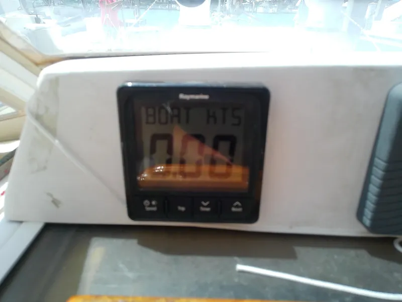 Slide: The Image of Raymarine instruments on 2004 J Boats J/32 showing speed 6.67 knots and wind angle 112 degrees. - 35