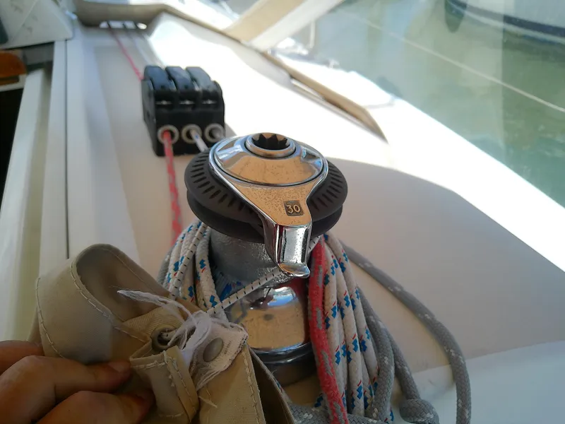 Slide: The Image of Winch and ropes on a 2004 J Boats J/32 sailboat deck. - 46
