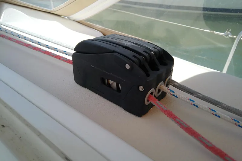 Slide: The Image of Close-up of a rope clutch on a 2004 J Boats J/32 sailboat deck. - 48