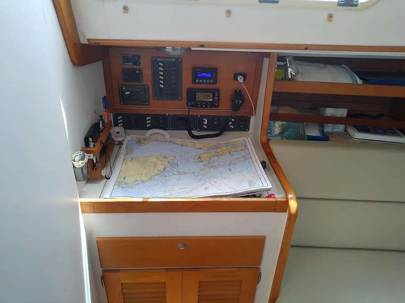 Slide: The Image of Control panel of a 2004 J Boats J/32 sailboat with navigation and communication equipment. - 56