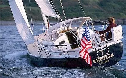 Slide: The Image of 2004 J Boats J/32 sailboat keel on stands, resting on gravel surface. - 80