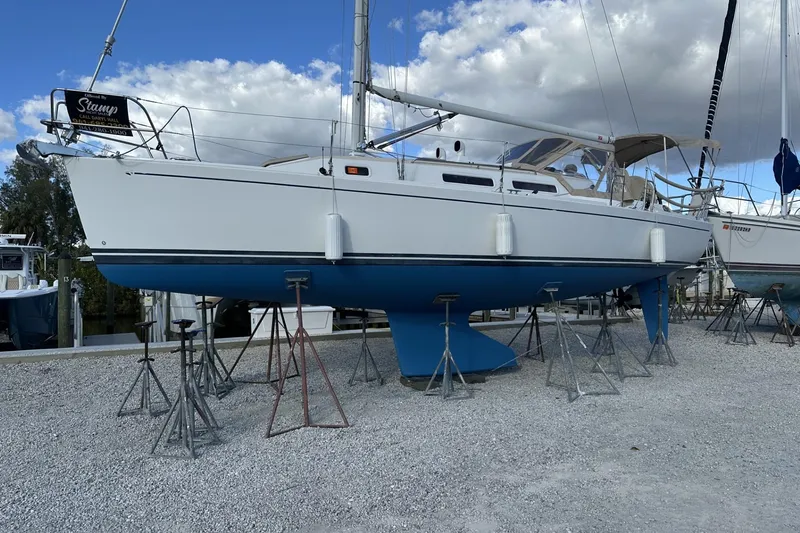Slide: The Image of 2004 J Boats J/32 sailboat keel on stands in a boatyard. - 84