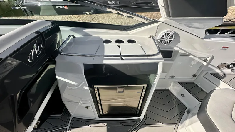 Slide: The Image of 2022 Monterey 298SS boat interior with sleek design and modern amenities. - 7