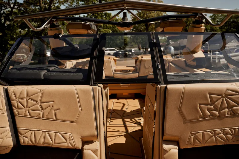 Slide: The Image of 2025 Nautique Super Air Nautique G25 Paragon interior with luxurious seating and modern design. - 14