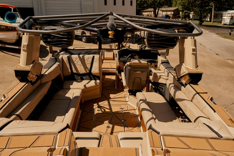 Slide: The Image of 2025 Nautique Super Air Nautique G25 Paragon interior with luxurious seating and advanced features. - 18