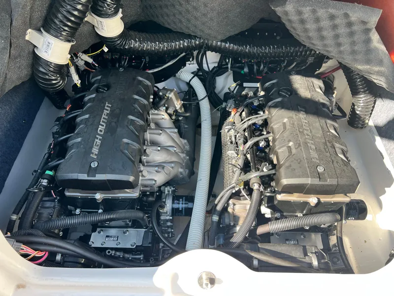 Slide: The Image of 2019 Yamaha Boats 242 Limited S engine compartment with dual engines. - 11