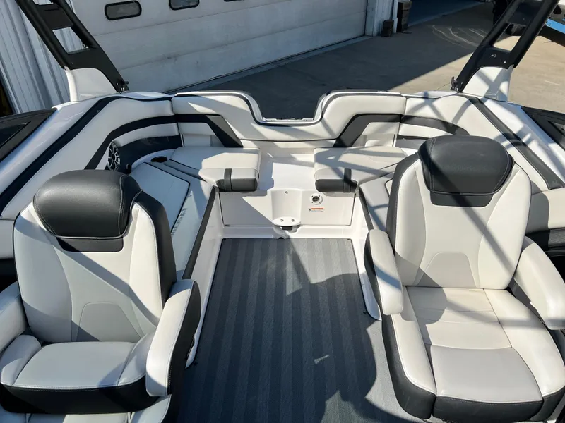 Slide: The Image of 2019 Yamaha Boats 242 Limited S interior with sleek seating and modern design. - 8