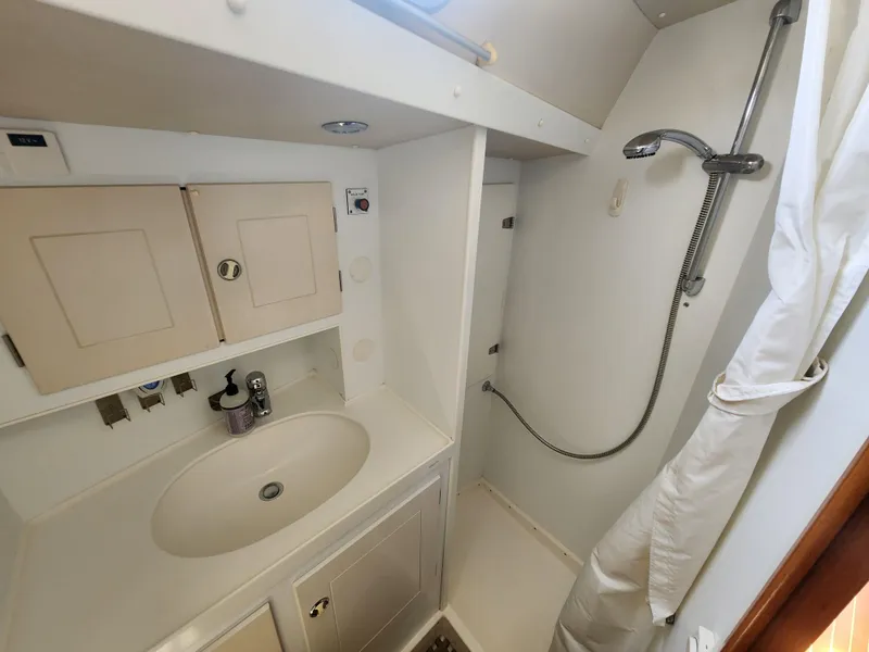 Slide: The Image of Bathroom interior of 2003 Hallberg-Rassy 46 yacht with shower and sink. - 49