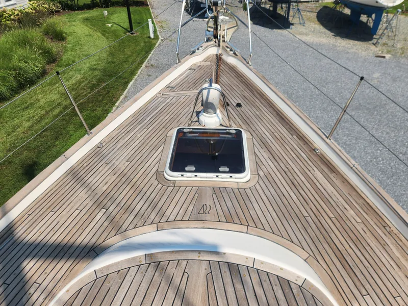 Slide: The Image of Deck of 2003 Hallberg-Rassy 46 sailboat with wooden finish and hatch. - 6