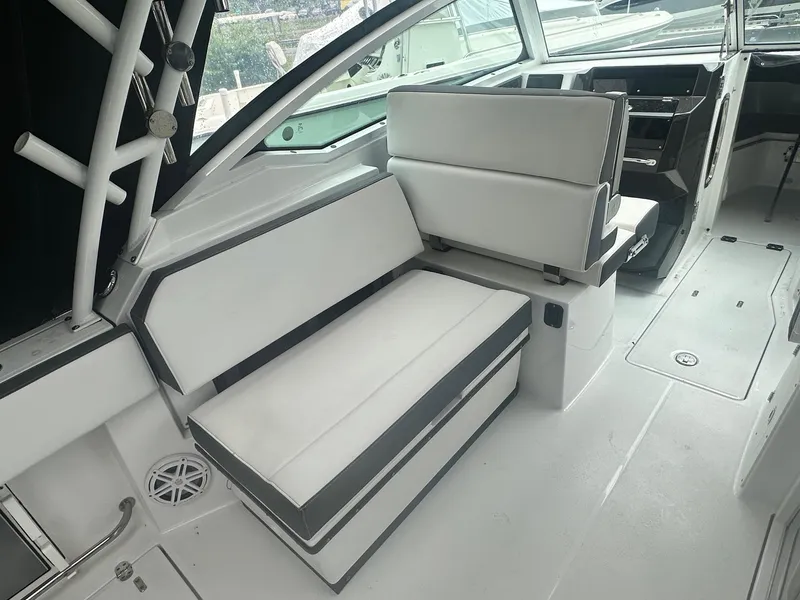 Slide: The Image of 2020 Blackfin 272 DC boat interior with white seating and modern design. - 21