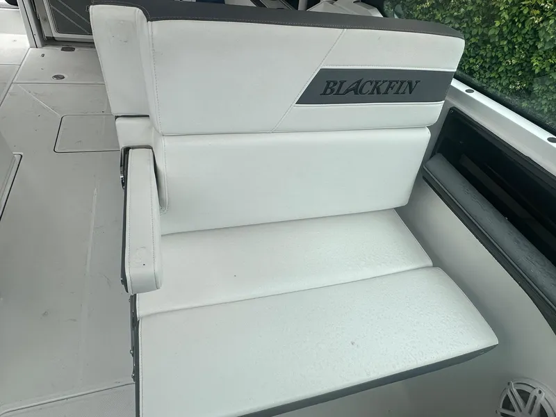 Slide: The Image of White seating on 2020 Blackfin 272 DC boat, featuring sleek design and comfortable upholstery. - 30