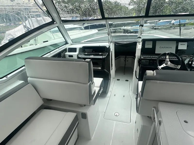Slide: The Image of Interior of 2020 Blackfin 272 DC boat with modern seating and navigation equipment. - 31