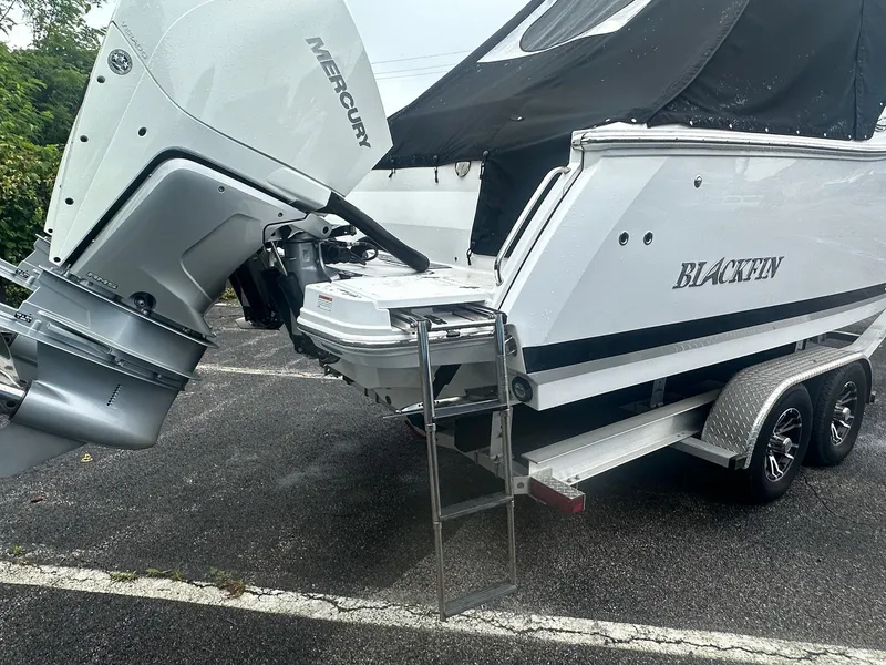 Slide: The Image of 2020 Blackfin 272 DC boat with Mercury engine on a trailer. - 4