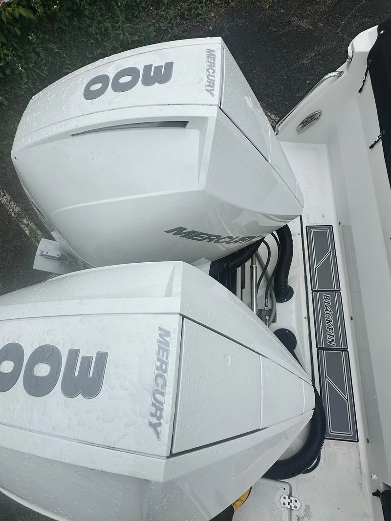 Slide: The Image of 2020 Blackfin 272 DC boat with twin Mercury outboard engines. - 8