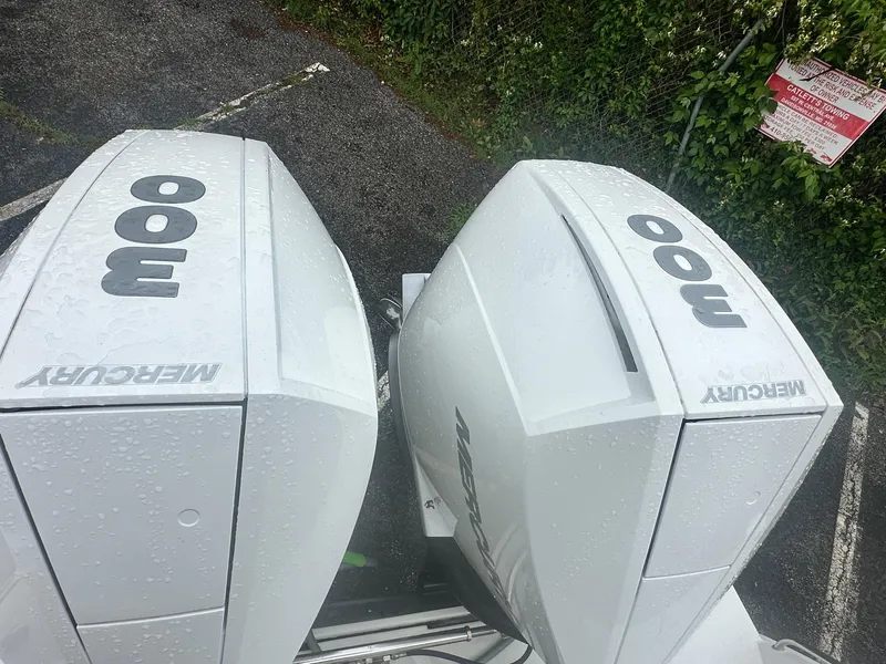 Slide: The Image of Twin Mercury 300 outboard engines on a 2020 Blackfin 272 DC boat. - 9