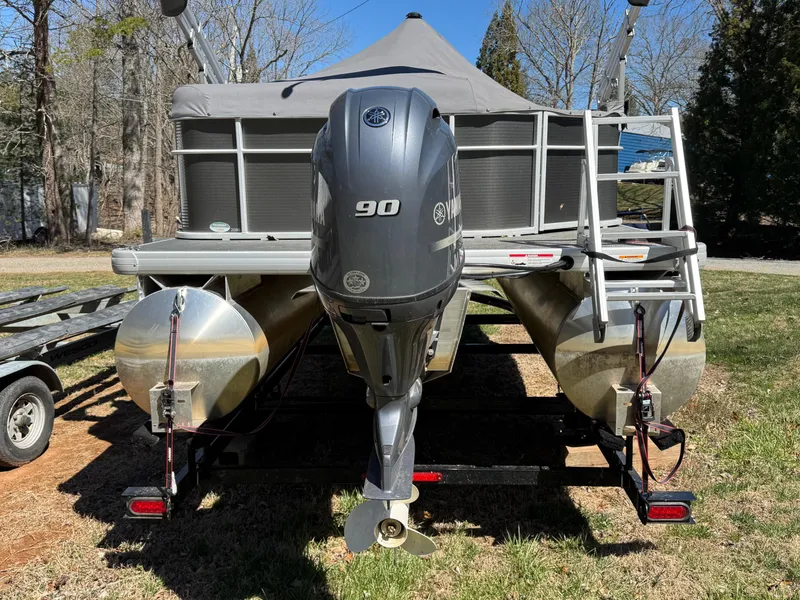 Slide: The Image of 2023 Godfrey Sweetwater 2086 C pontoon boat with 90 HP engine on trailer. - 4