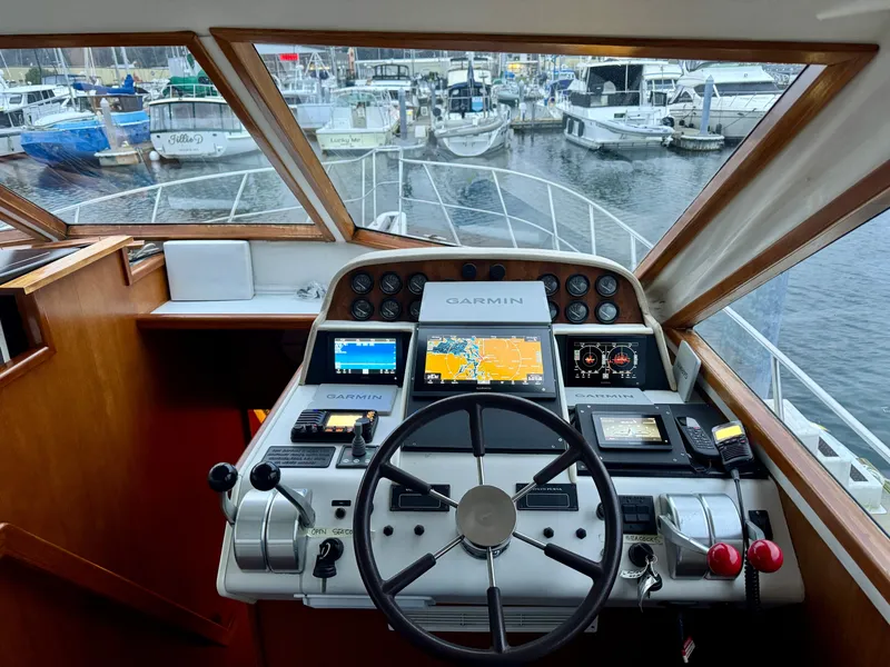 Slide: The Image of Cockpit of 1993 Navigator 5000 Classic yacht with Garmin navigation system at marina. - 17