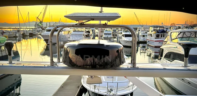 Slide: The Image of Sunset view from Navigator 5000 Classic yacht, docked in a serene marina, 1993 model. - 41