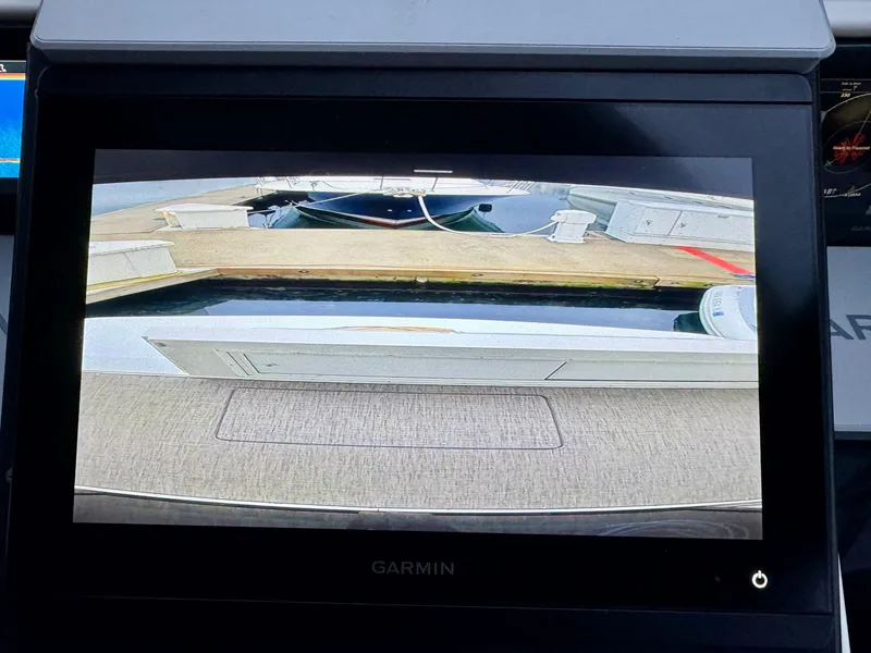 Slide: The Image of Garmin display showing Navigator 5000 Classic boat's rear view, 1993 model. - 48