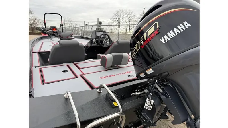 Slide: The Image of 2025 Xpress H18 boat with Yamaha engine, featuring sleek design and modern seating. - 10
