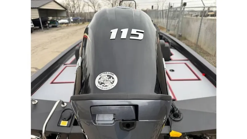 Slide: The Image of 2025 Xpress H18 boat with 115 horsepower engine, parked outdoors. - 2