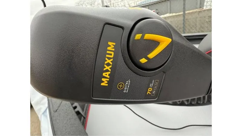 Slide: The Image of Close-up of Maxxum control panel on 2025 Xpress H18 boat. - 3
