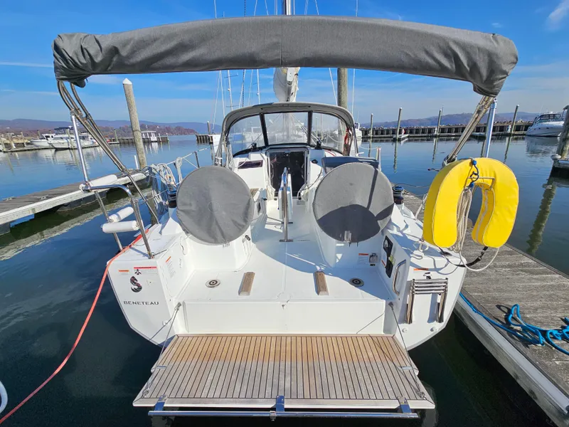 Slide: The Image of Beneteau Oceanis 30.1 sailboat, 2022 model, docked at marina with blue sky background. - 3