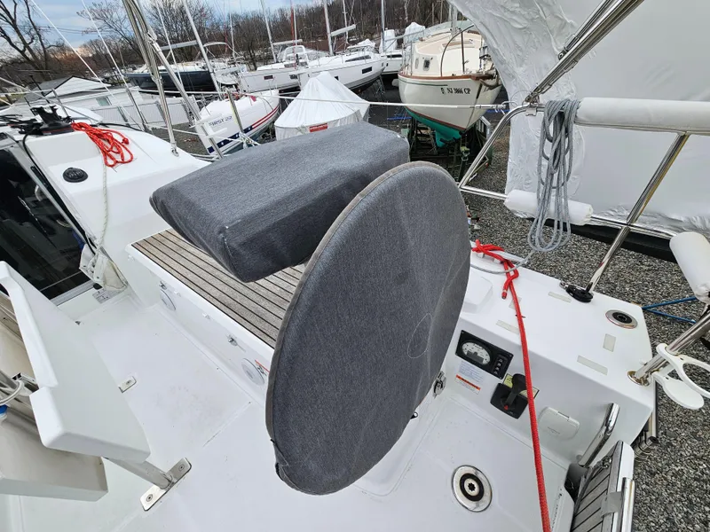 Slide: The Image of Beneteau Oceanis 30.1 sailboat cockpit, 2022 model, with covered steering wheel and seating. - 8