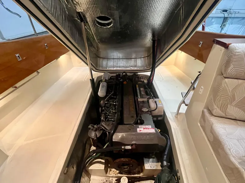 Slide: The Image of Engine compartment of a 2005 Hinckley Picnic Boat EP, showcasing interior details and design. - 23