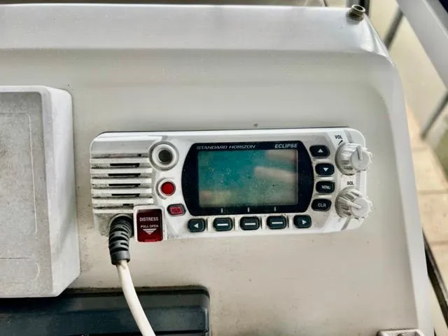 Slide: The Image of Standard Horizon Eclipse radio on 1998 Carver 405 Motor Yacht dashboard. - 14